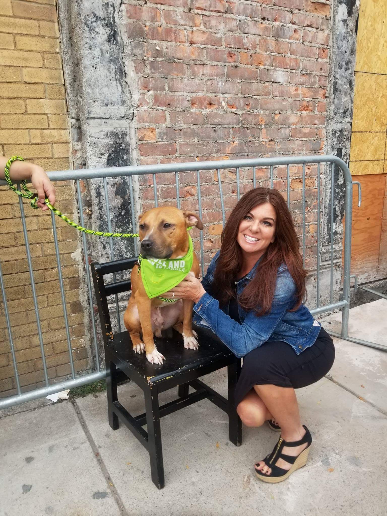 Christine from Wag 'N' Tails posing with pit bull dogs